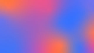 A smooth gradient background with warm hues of orange and pink blending into cooler shades of blue and purple, creating a soft, abstract appearance.