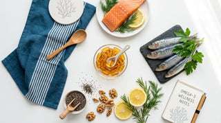 Flat lay of amber omega-3 softgels with salmon, sardines, walnuts and chia seeds on white