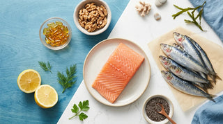 Coastal flat lay of omega-3 rich foods and amber softgels on ocean-blue and white surfaces