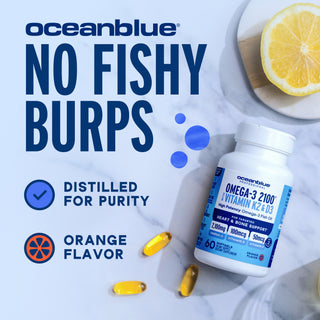 A bottle of Omega-3 2100 with Vitamin K2 & D3 Minis, capsules, lemon slice, and “No Fishy Burps, Orange Flavor” text.