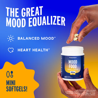 Hands holding Mood Food*—supports mood, heart, and brain health in a mini softgel.